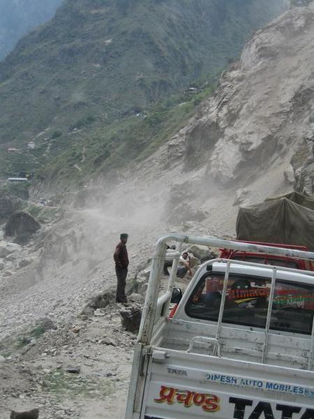 Waiting for a small land-slide to subside on the road to Sangla