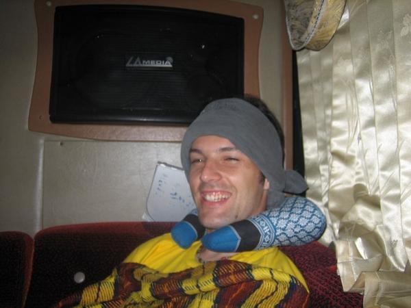 Casto had the right idea, he bought this travel pillow on Khao San before we left (Leti's photo)