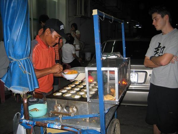 Buying sweet snacks from local street vendor (Mum's photo)