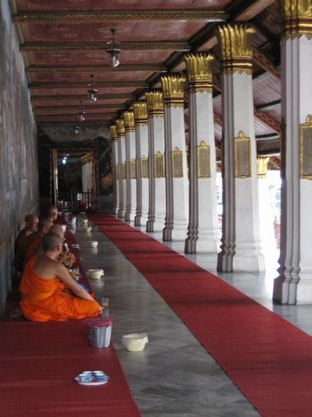 Monks having lunch, Grand Palace (Mum's photo)