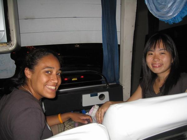 Leti & Jen on the bus to the Thai-Laos border