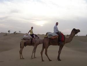 Steve and Suzanne riding camels