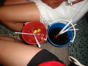 Buckets with tanned legs!