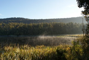 a misty morning on lake matheson
