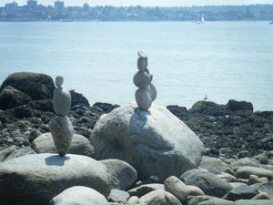 an artist in stanley park spent hours balancing rocks on top of each other, strange but pretty cool