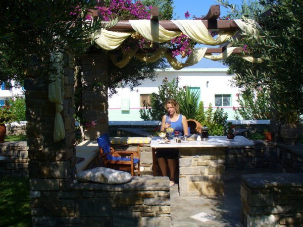 our favourite breaksfast spot - under the bouganvillia