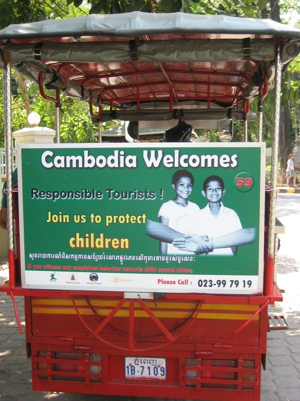 Anti-trafficking sign on tuk-tuk