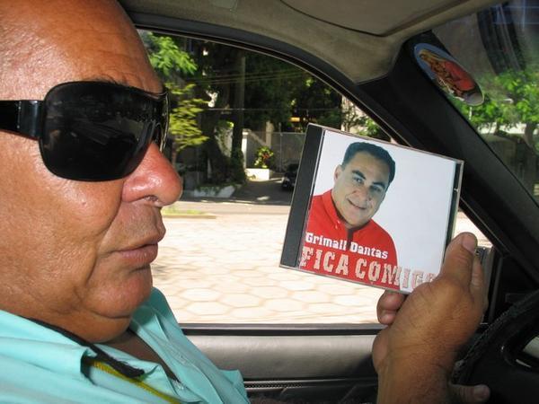 Our taxi driver Dantas with his last masterpiece "Fica Conmigo"