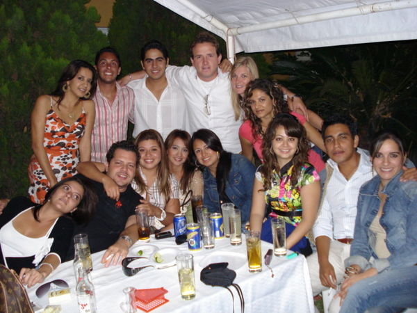 A Group Photo with Carlos' Friends at Cesar's Party