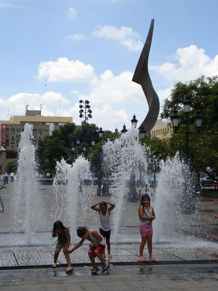 Children Playing in a Fountain - Plaza Tapatia