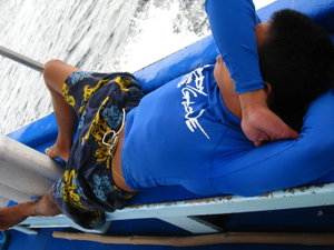 Lito sleeping on the boat