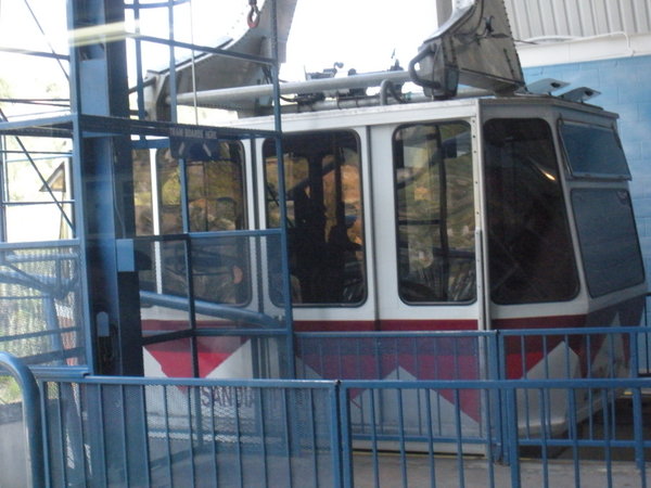 Boarding the tram at the station below