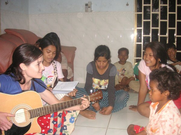 Teaching them to sing ''you are my sunshine''