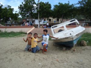 Local kids and boat