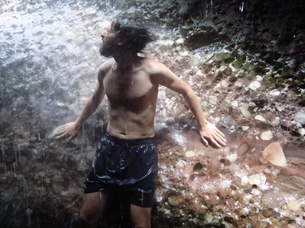Me shaking my wet, wet hair under the waterfall
