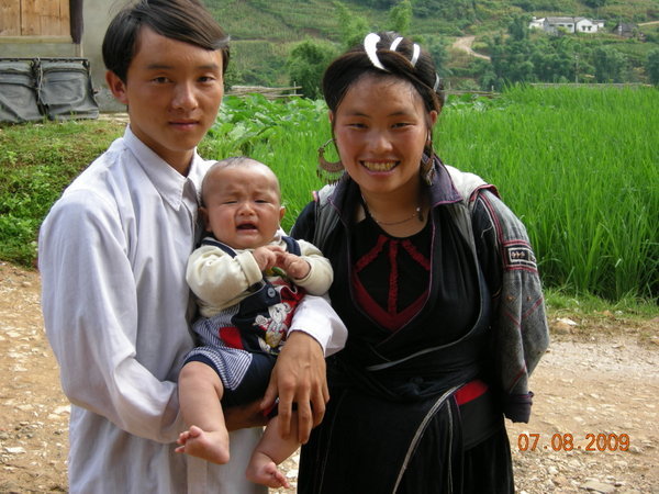 Bee, her husband, and their 3 month old baby