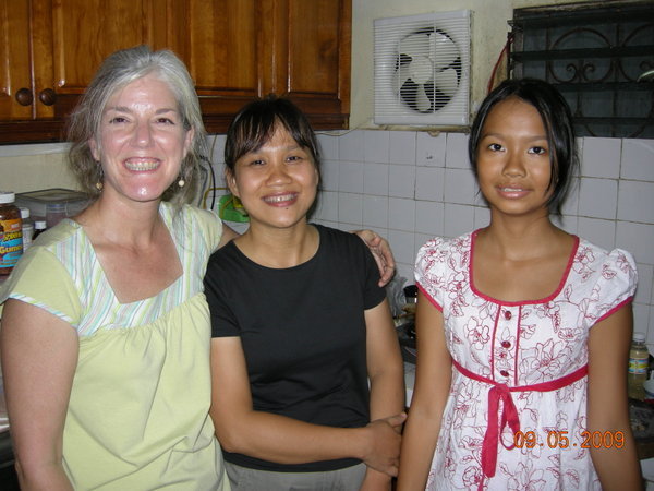 Nancy in the kitchen with Diep and Linh