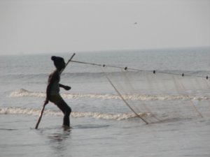 Fishermen pulling their net