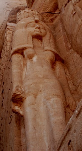 Abu Simbel Queen Neferteri at the feet of Ramasses II.