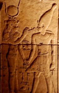 Philae mother god Isis offering Key of Life (Ankh) to her son Horus