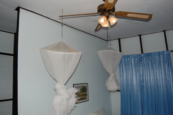 the mosquito nets over the beds