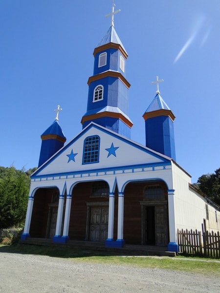Tenaun - the most colourful wooden church