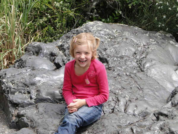 Amy sitting on some lava