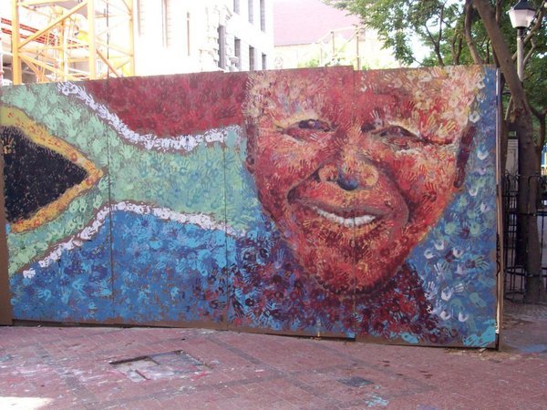 handprint mural of Nelson Mandela