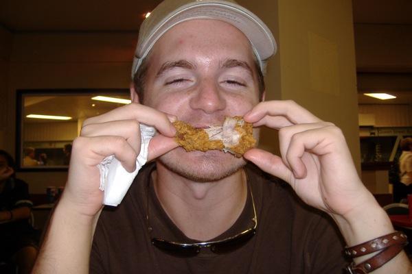 Tyler eating chicking in Brisbane mmm KFC