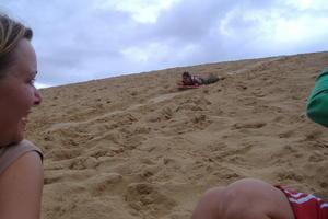 Sandboarding down the dune...almost went into the lake haha