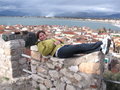 me laying on a rock thing overlooking Nafplion