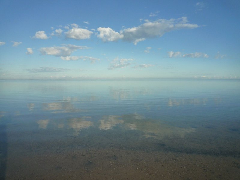 Clouds reflected on the still waters at Eagle Bluff
