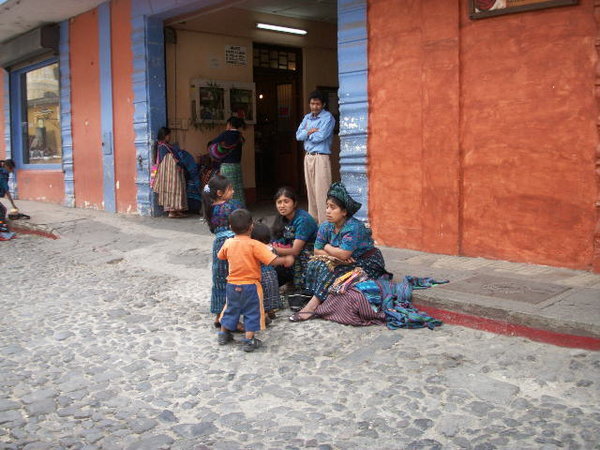 Typical Mayan family on the Sidewalk