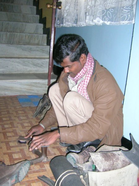 Cobbler mending my boots