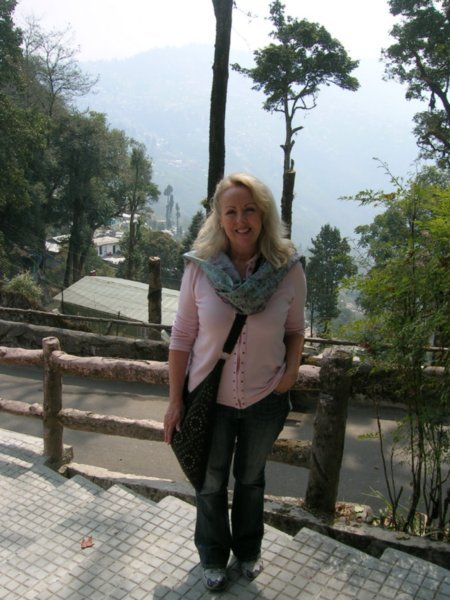 Me at the zoo with a good view of Darjeeling behind me.