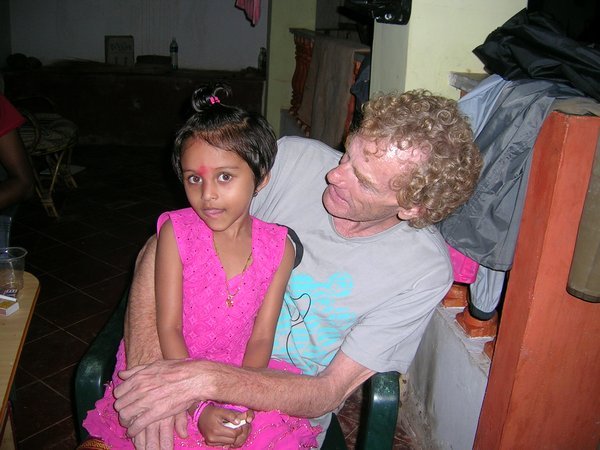 Pete with Khushi, Putu grand-daughter. It was Putu's house we were staying in.