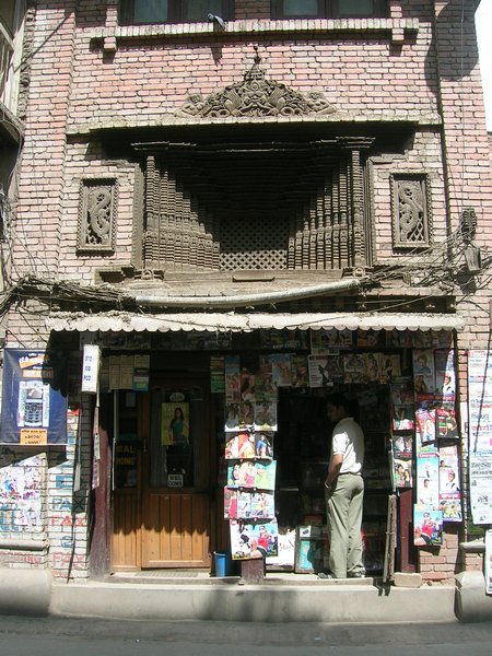 Suppposedly one of the mosy beautiful and elaborate windows in old Kathmandu, above a tacky magazine and photocopy shop.
