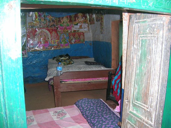 My bed, it was raised from the dirt floor but had no mattress. Was like sleeping on a door.