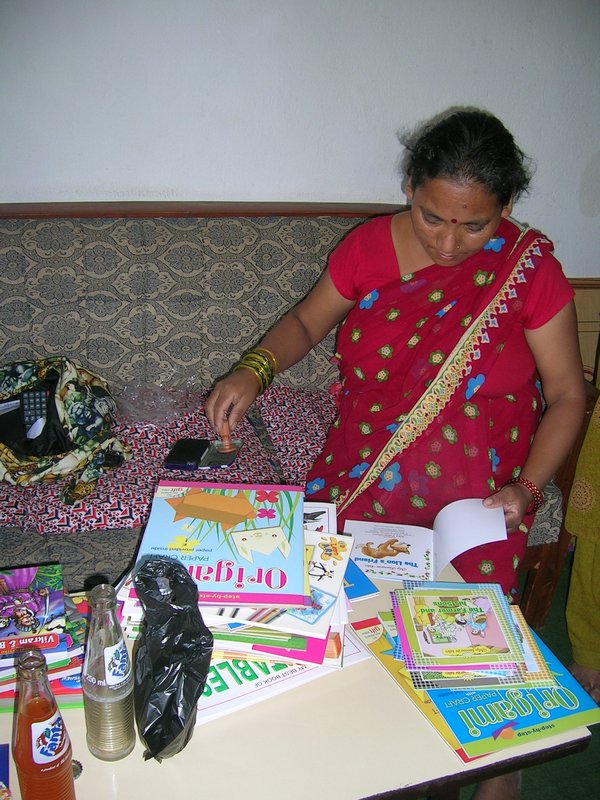 Then the job of stamping and covering the books began.