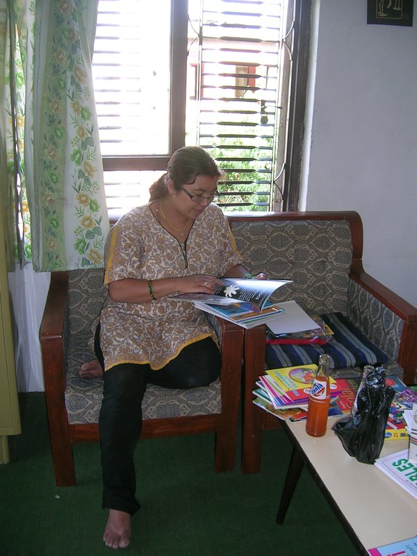 Even the principal could not resist reading some of the books we had bought.