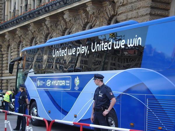 USA team bus in Hamburg. "United we play, United we win"? Hardly, more like "with United we will fly home in a week" 