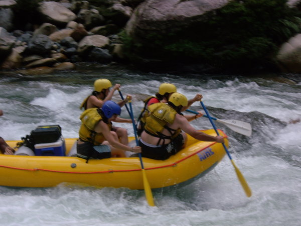 Paddling through our First rapid