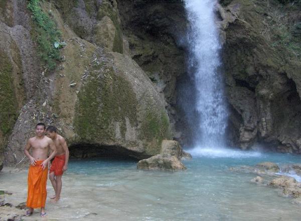Monks by the waterfall