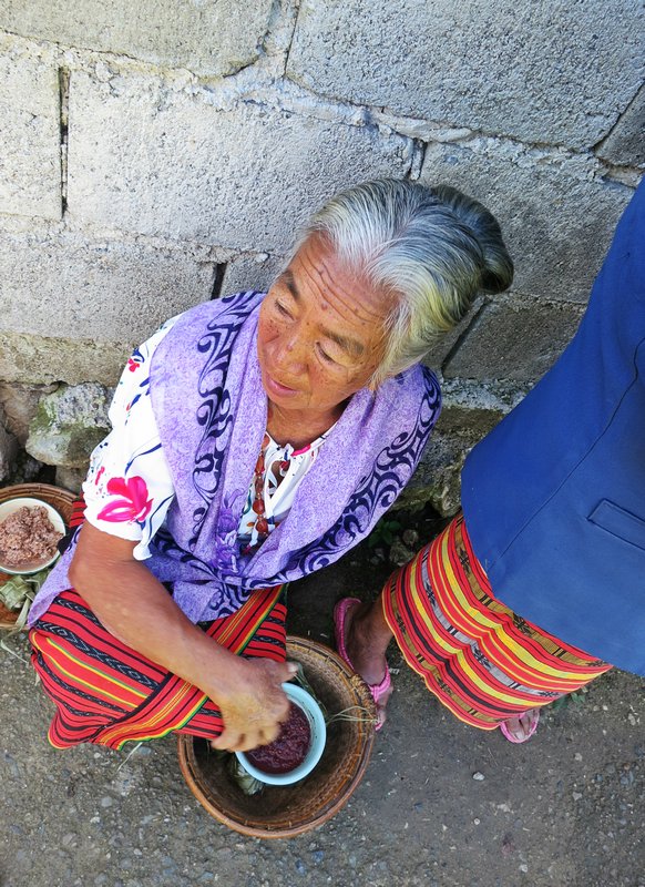 a woman with her offerings
