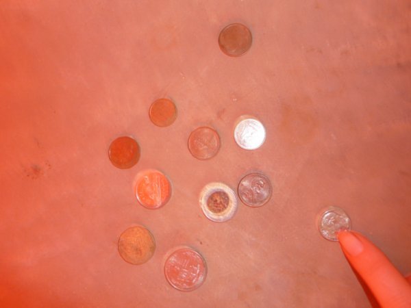 coins left in my room from around the world