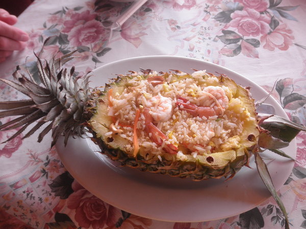 Pineapple stuffed with Shrimp and Vegetable Roasted Rice
