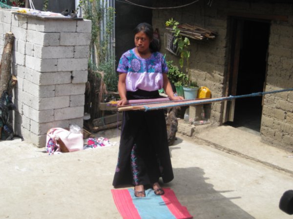 Our Zinacantan hostess demonstrating weaving.