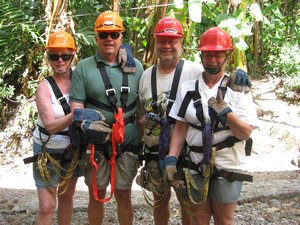 The four of us suited up for zip lining.