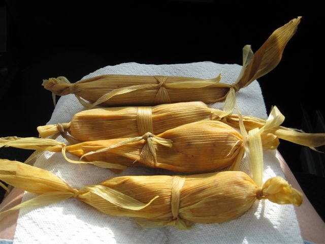 Mexican fast food.  Shrimp (camarone) tamales sold along the road.  Aren’t they pretty?