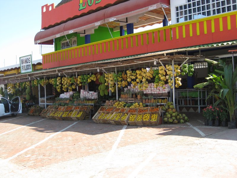 I just love the pretty fruit stands.
